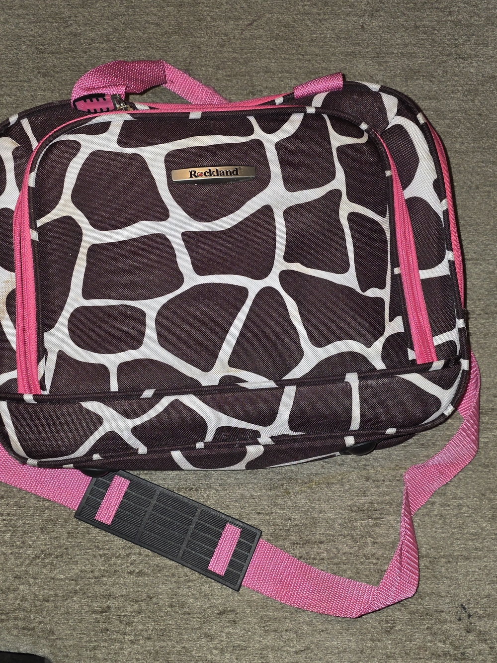 Rockland Fashion Softside Upright bag in the pink giraffe pattern